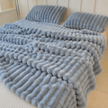 Verzwaarde fleece deken